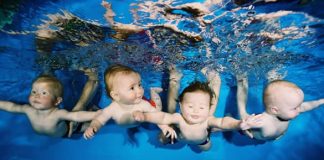Adorable Babies Swimming Underwater