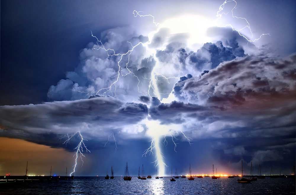 Lightning illuminates a cumulonimbus cloud over Corio Bay, Victoria, Australia, by James Collier.
