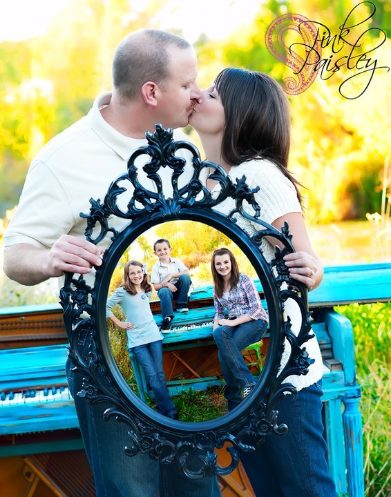 This Kiss A picture within a picture, displaying their pride and joy. PINK PAISLEY PHOTOGRAPHY