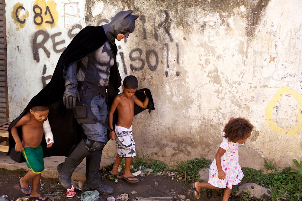 Batman at the Favela Metro-Mangueira  Photograph by Elisabete Maisao