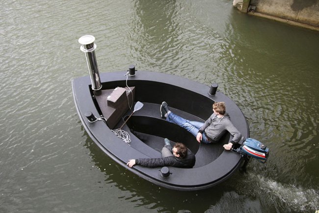 The HotTug. A Motorized Floating Wood-Fired Hot Tub!