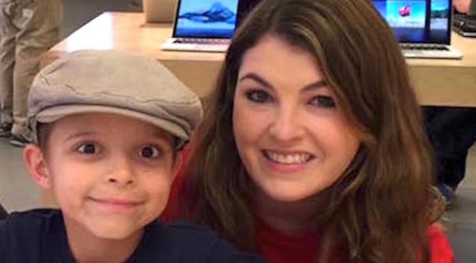 Her Son Poses For A Photo With A Stranger, Then Mom Sees THIS In Her Eyes. Unbelievable.