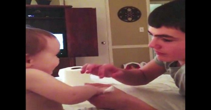 Brother Shows Him A Trick With Paper – Baby’s Reaction Has The Family Totally Losing It