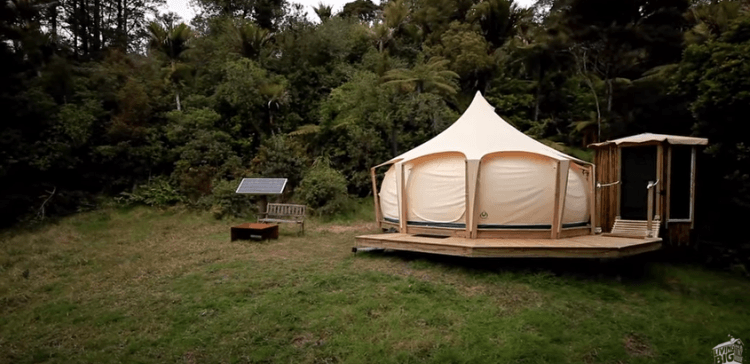 Ever heard of a lotus belle tent? If not, you’re about to be amazed. This man is living inside this gorgeous tent in the forest while his tiny house is being constructed. The tent itself is beautiful, but wait until you see what he’s done to the inside! Absolutely lovely.