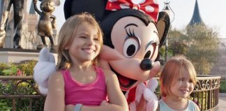 2 Little Girls Pose For A Photo At Disney World. Now Look Closely At Minnie Mouse