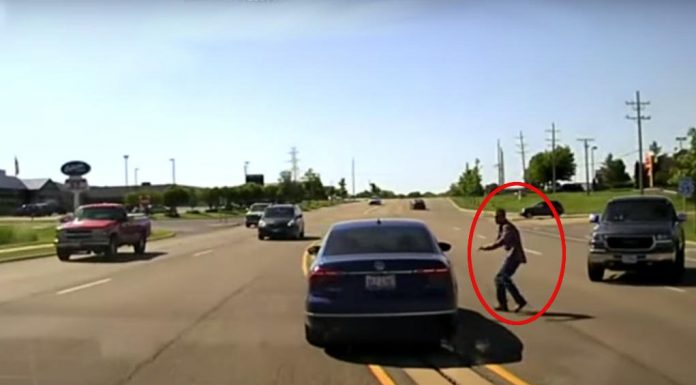 Man Makes An Amazing Dive To Save This Driver